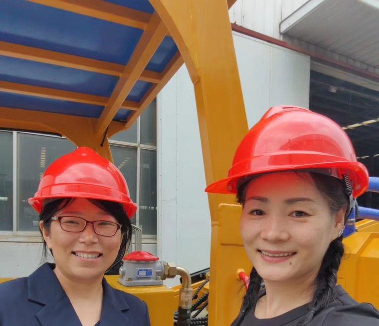 Mrs. Qianyun conducting a pre-loading inspection at a pile driver factory in China